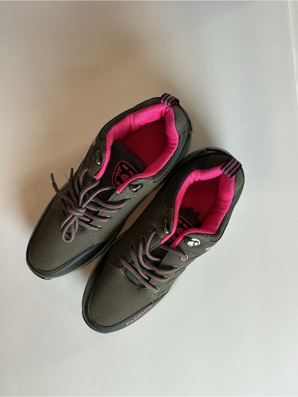 NWOT Women’s Waterproof Slip-on Sneakers in Black with Pink Interior New